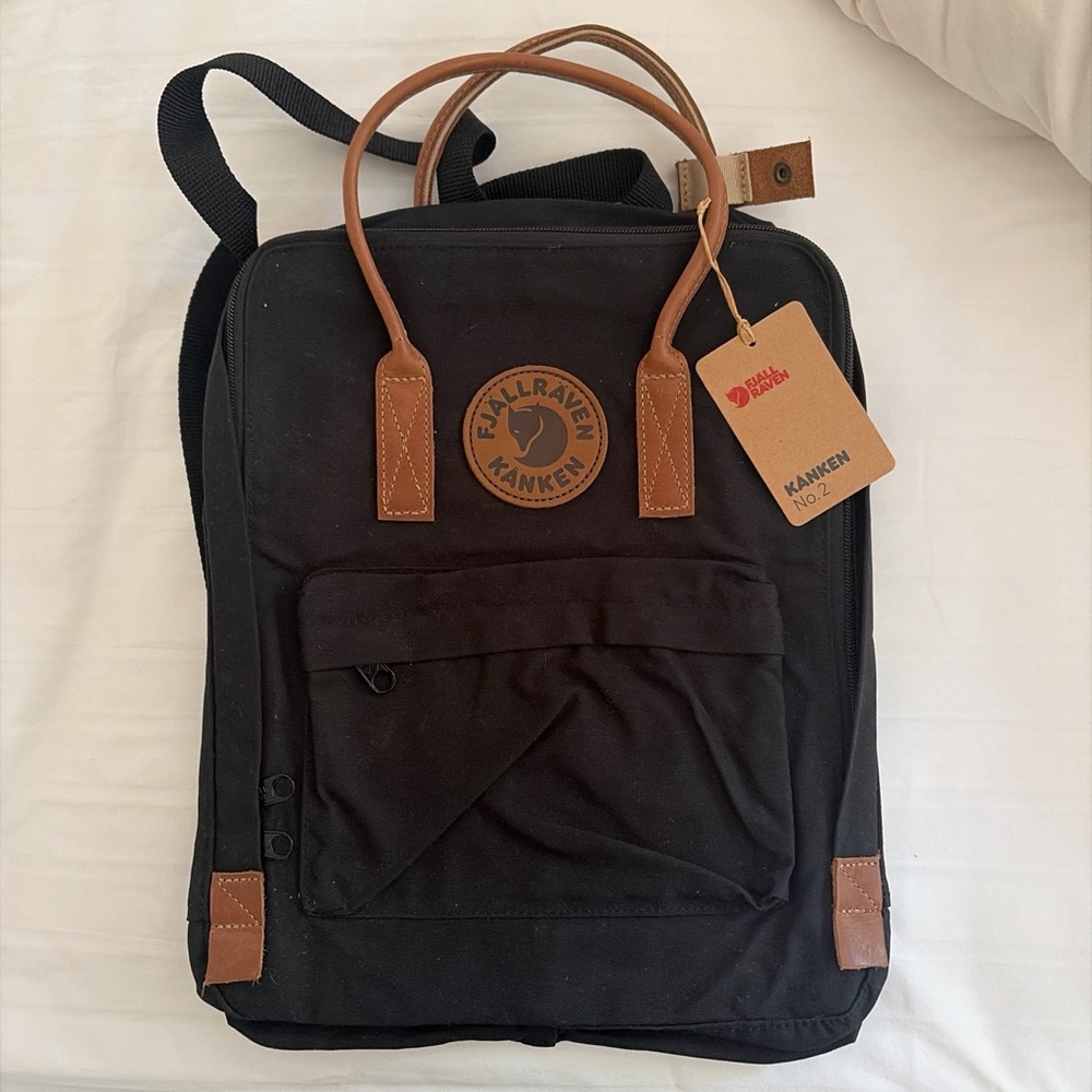 Fjallraven Kånken Black Backpack with Brown Leather Accents